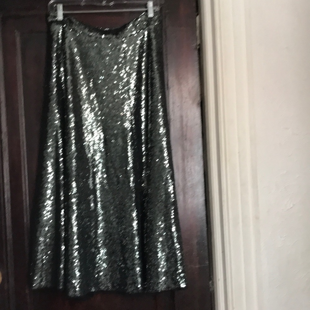 New tags, moss green sequined skirt.